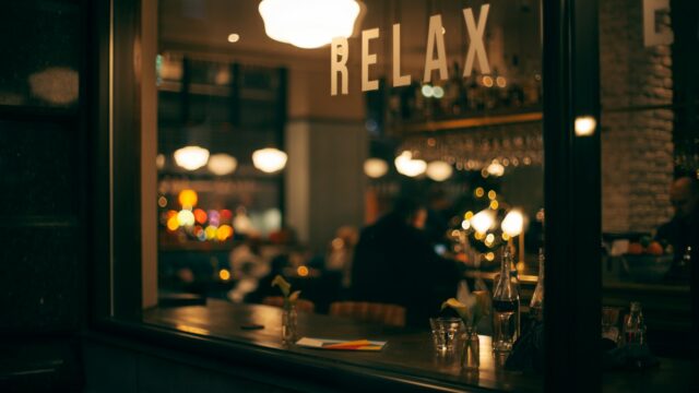 person sitting inside restaurant